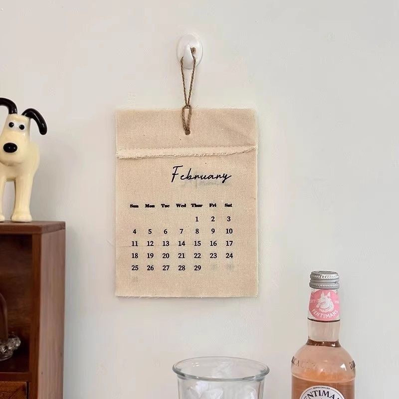 Fabric wall calendar display set with rope hanger and magnetic clip