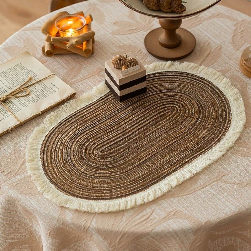 Coffee brown oval placemat, woven texture and fringe