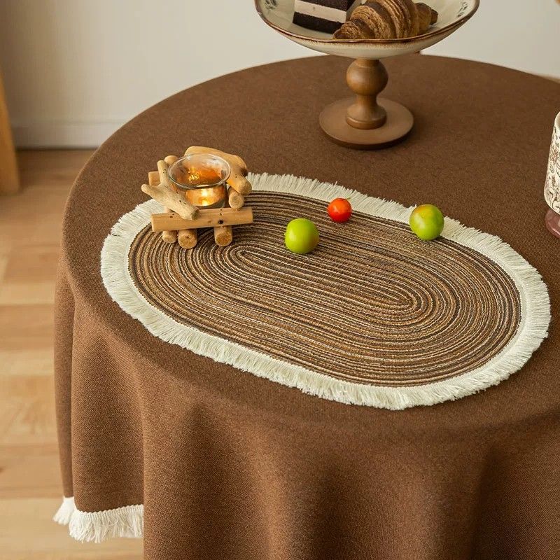 Coffee brown fringed placemat styled on a dining table
