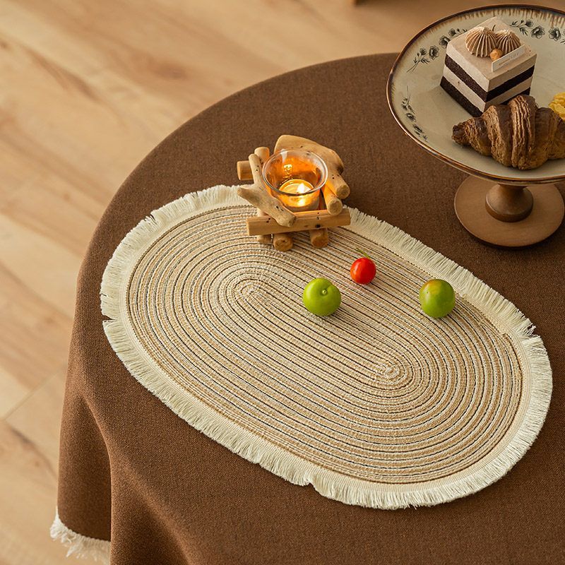 Beige and coffee oval fringed placemats