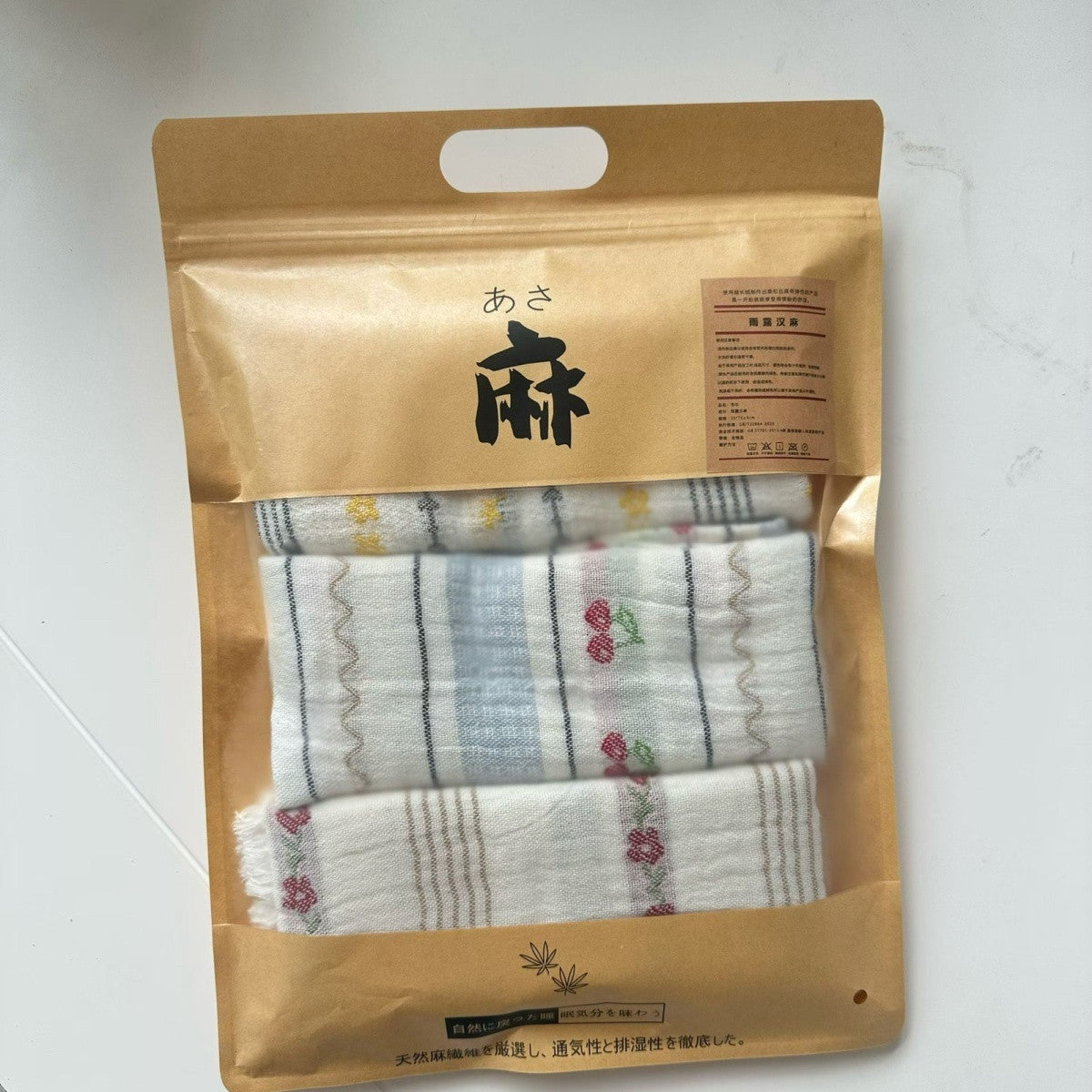 Three-piece striped gauze hand towel set in kraft packaging